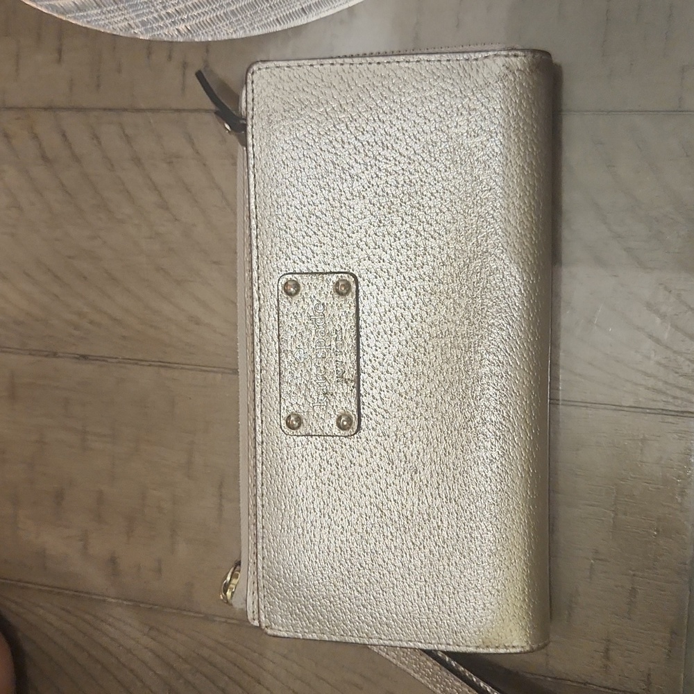 Kate Spade Wellesley Rose Gold Leather Wristlet.